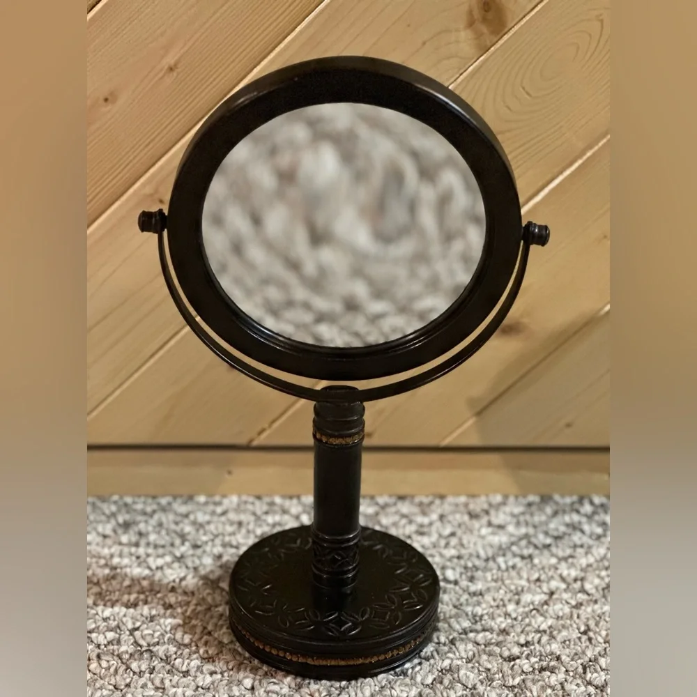 Bathroom countertop double sided magnification mirror.